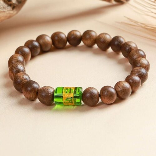 Vòng tay trầm hương tròn đơn mix hạt om mani